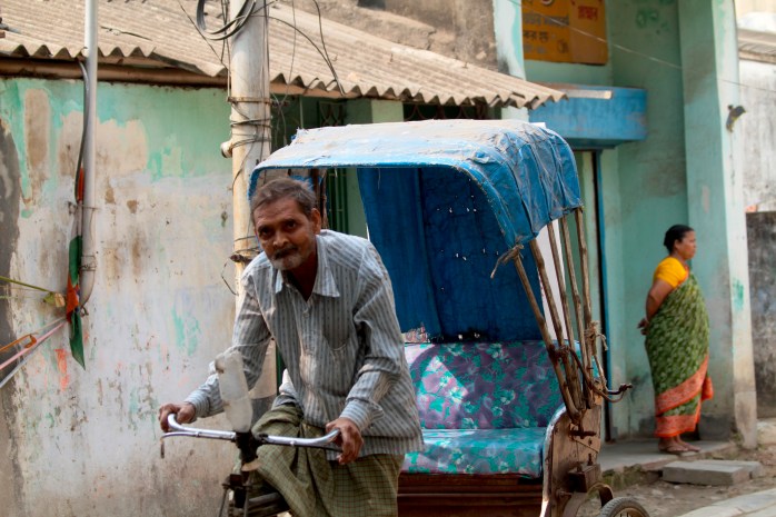 man and his rickshaw