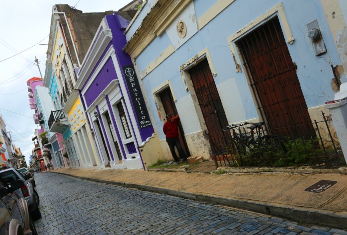 man-in-red-shirt-and-purple